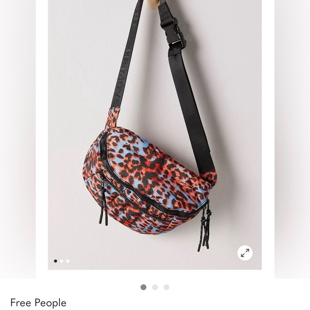 Free People quilted sling bag. Sci fi animal print